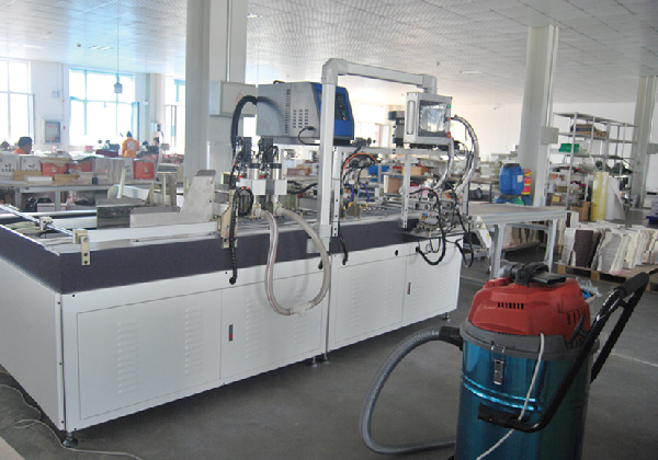 全自動(dòng)打孔貼磁鐵機(jī)